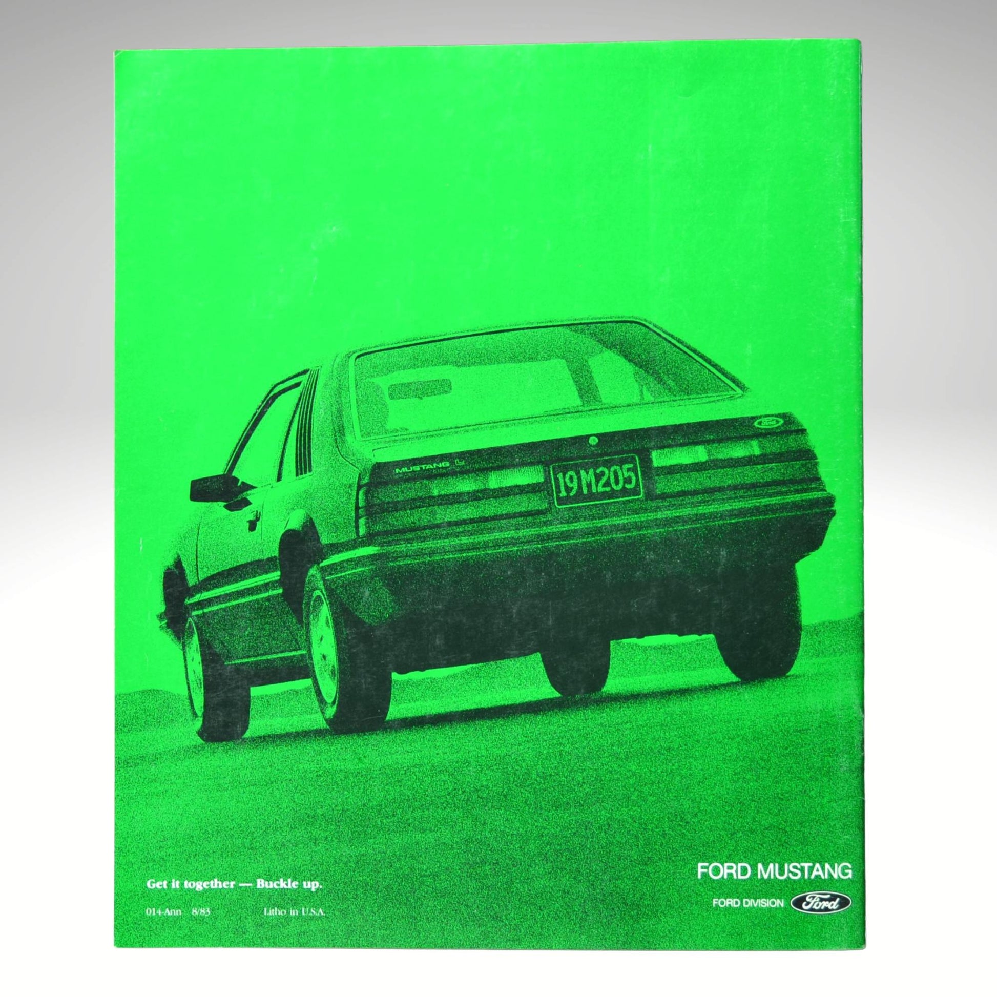 Green Ford Mustang poster on a gray background