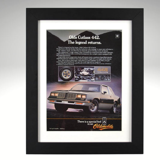 Framed 1984 Oldsmobile 442 ad – vintage print with silver Cutlass, 442 badge, and performance callouts.
