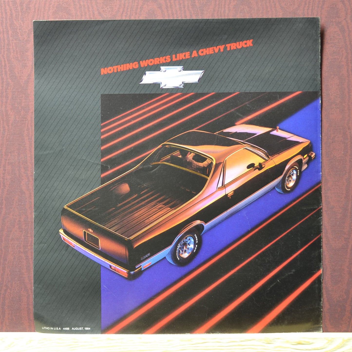 1985 Chevy El Camino dealer brochure featuring the dramatic SS package in black with bold styling back page