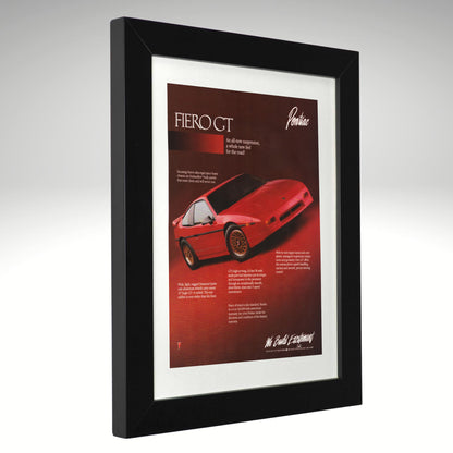 1987 Pontiac Fiero GT framed vintage advertisement angled view black wood frame