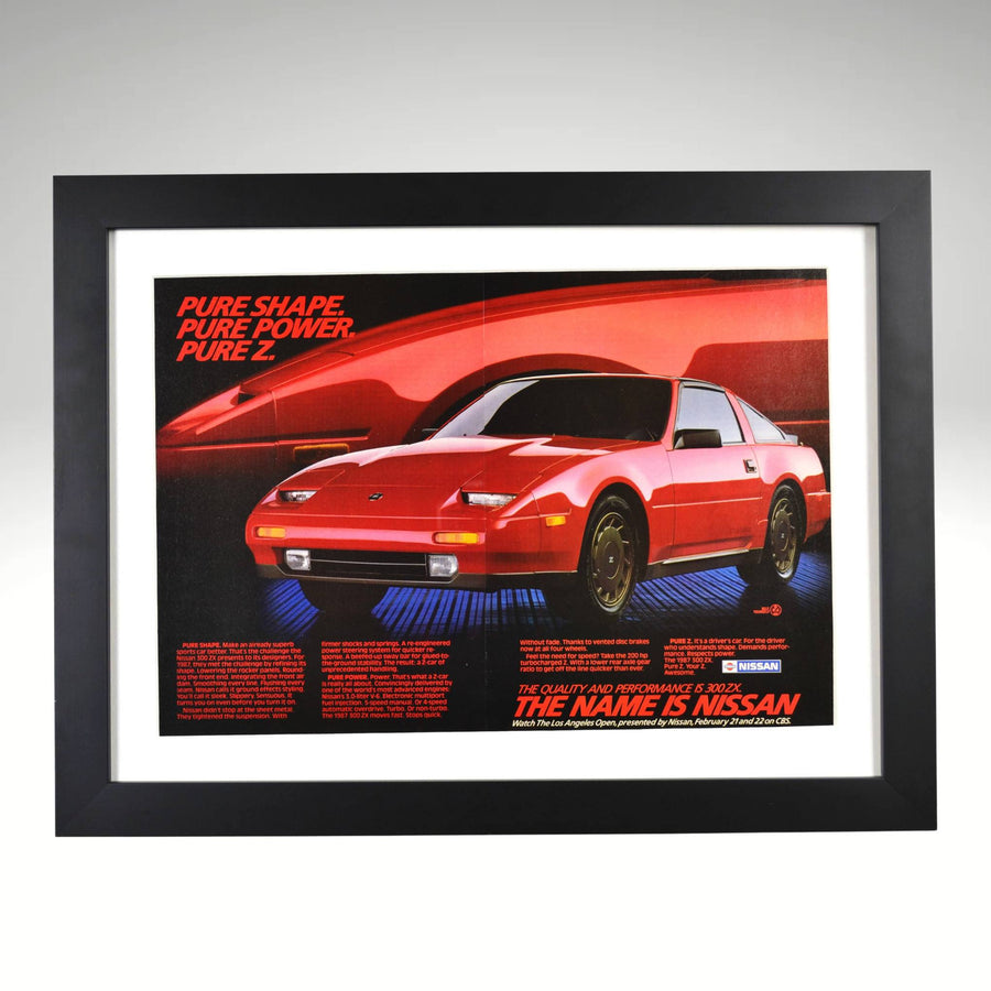 Framed 1987 Nissan 300ZX vintage ad with “Pure Z” headline and red-on-black design

