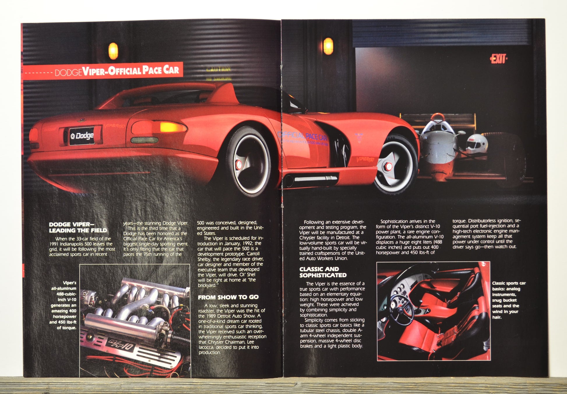 Brochure or magazine page featuring a red 1991 Dodge Viper Official Pace Car with text and images on a black background.