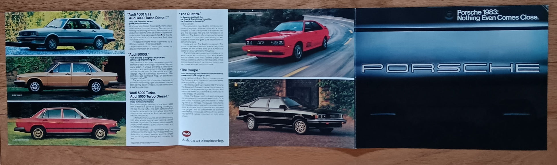 1993 Porsche Audi brochure open to a page with Audi car images and text 