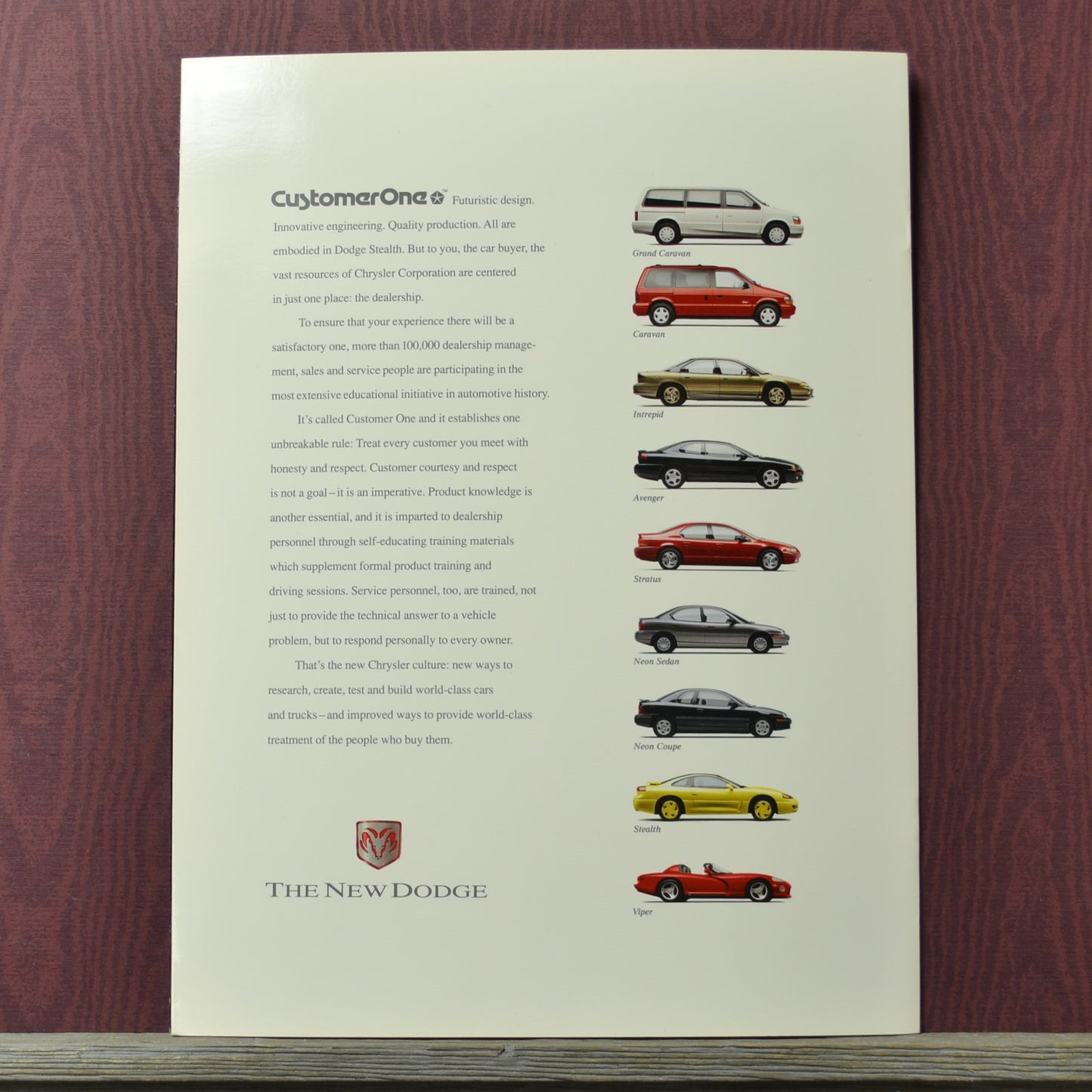 Brochure with images of 1995 Dodge vehicles on brochure back page