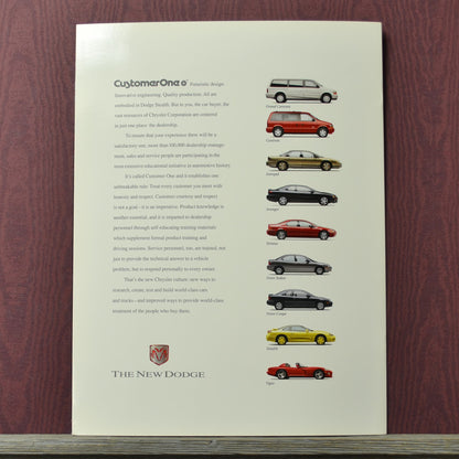 Brochure with images of 1995 Dodge vehicles on brochure back page