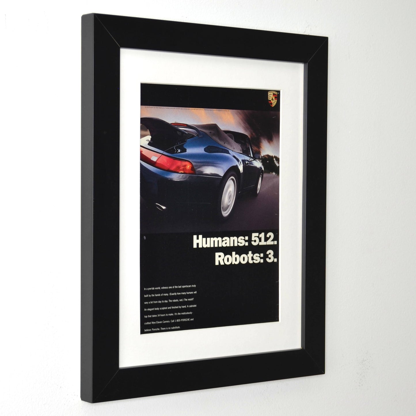 Framed 1995 Porsche 911 Carrera Cabriolet ad – Humans 512 Robots 3 – vintage Porsche print with new frame, mat, and glass side view
