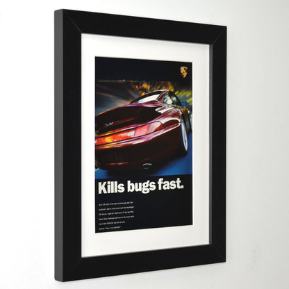 Framed 1996 Porsche 911 Turbo print ad with “Kills Bugs Fast” headline – vintage automotive wall art with new frame, mat, and glass side view