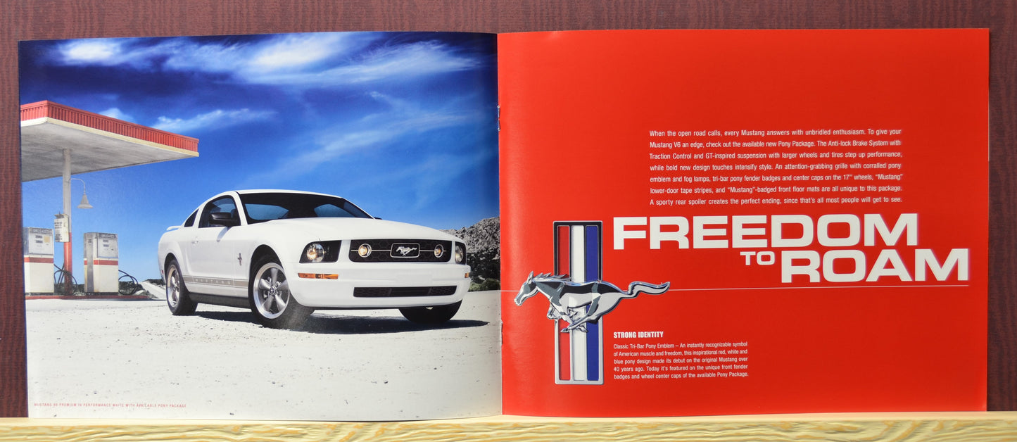 2006 Ford Mustang Dealer Brochure - Freedom to Roam Spread with White Mustang V6 at Gas Station