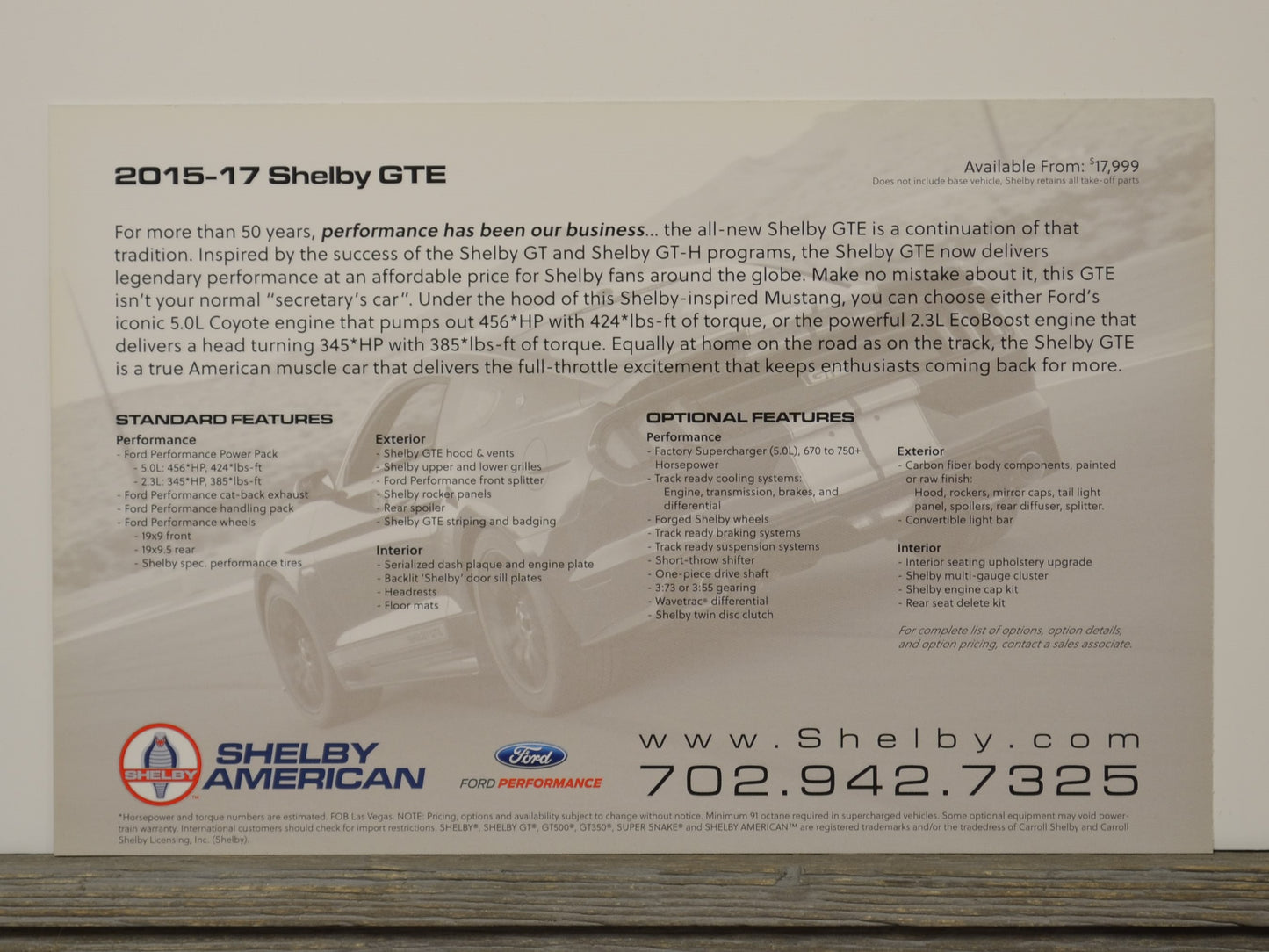 Brochure or flyer for 2015-17 Shelby GTE with text and graphics on a wooden surface.