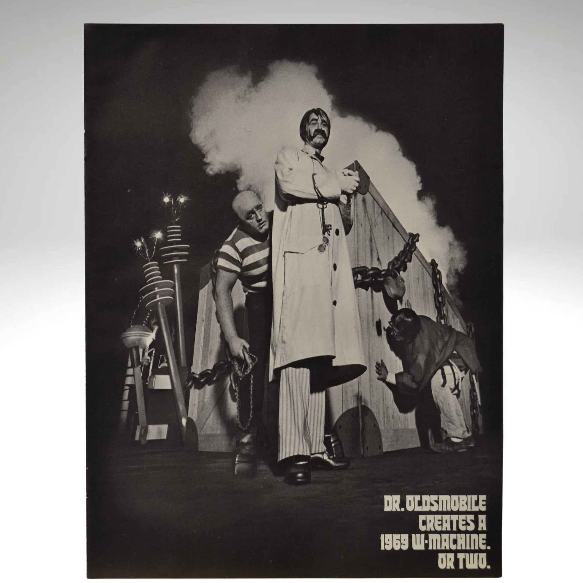 Cover of 1969 Oldsmobile W-Machines brochure with Dr. Oldsmobile and smoke