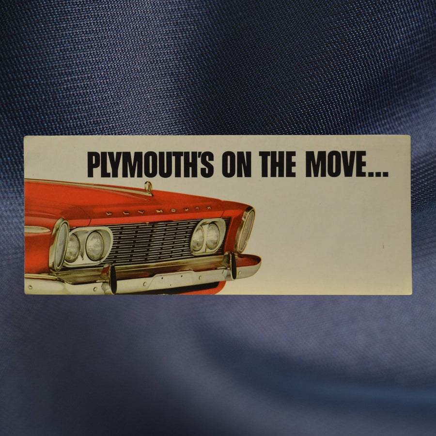1963 Plymouth brochure front cover – On the Move slogan with red car