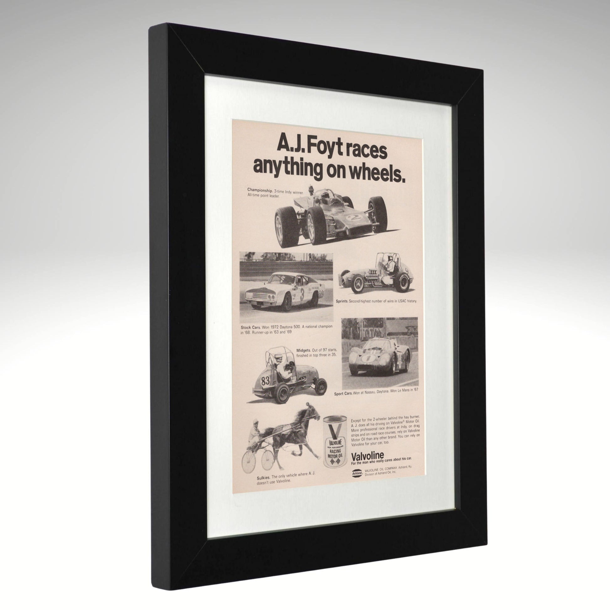 Framed vintage advertisement for A.J. Foyt racing and Valvoline oil 