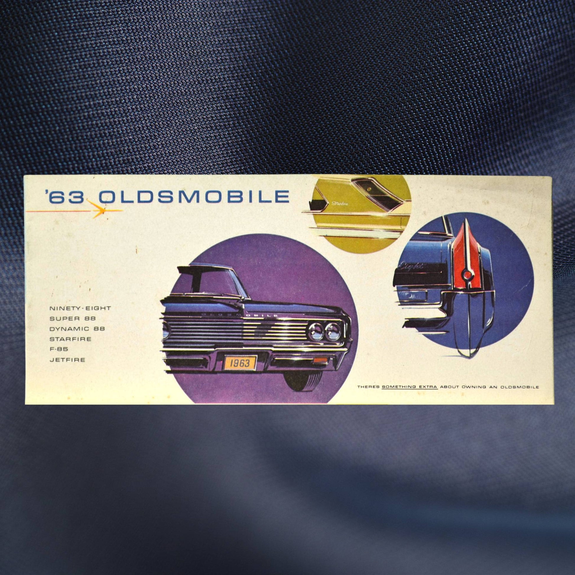 Cover of 1963 Oldsmobile brochure with Starfire, Ninety-Eight and Jetfire illustrations