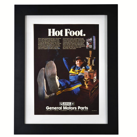 Framed vintage GM Parts ad featuring Dale Earnhardt in Wrangler suit after 1986 NASCAR championship win