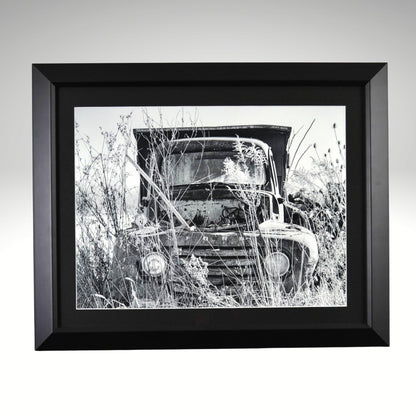 Black and white classic ford truck artwork in black frame