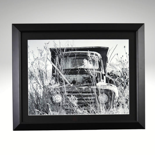 Black and white classic ford truck artwork in black frame