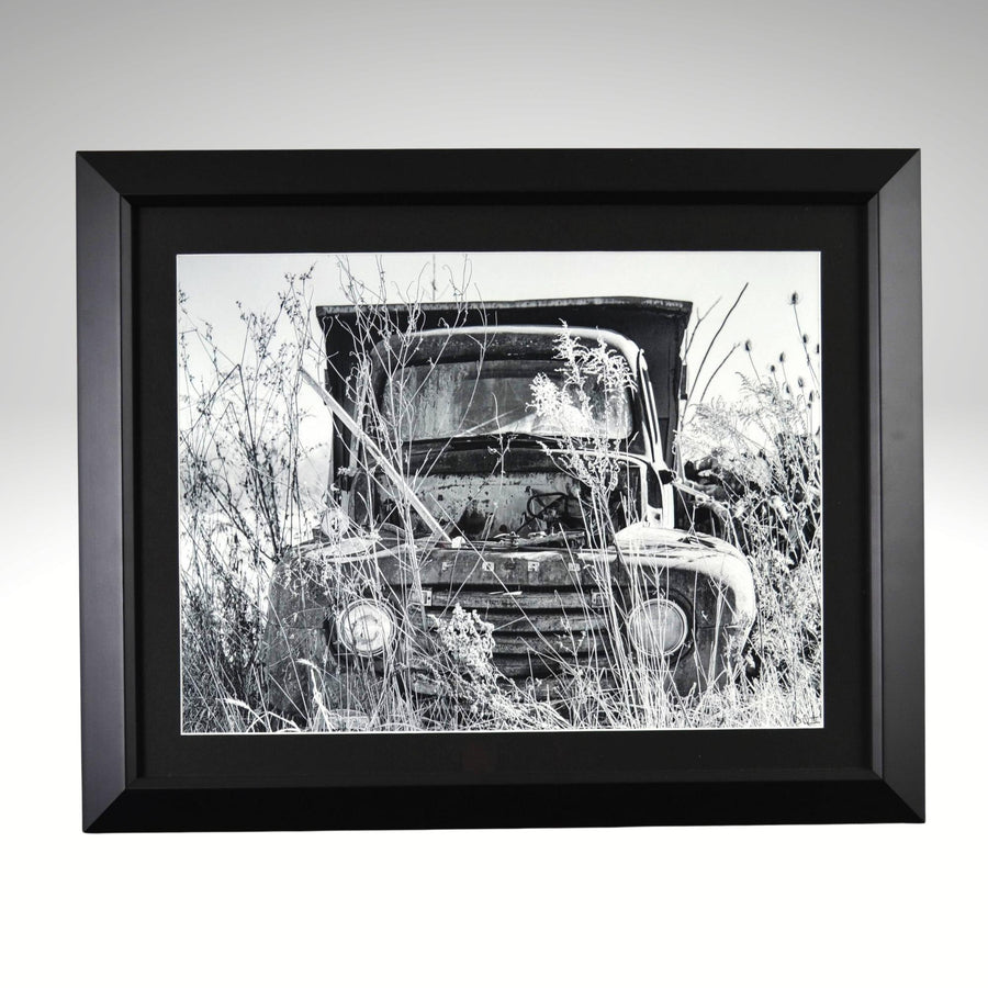 Black and white classic ford truck artwork in black frame