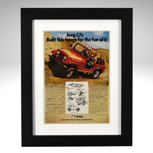 Framed advertisement for Jeep CJ with text 'Built this tough for the fun of it' on a desert background.