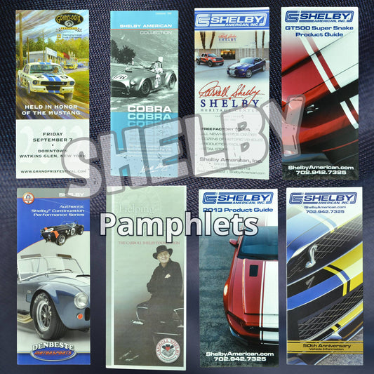 Collection of authentic Shelby and Ford sales pamphlets, featuring GT500 Super Snake, GT350, Cobra, Shelby Heritage Center, and Shelby 50th Anniversary brochures from the John Barnes Collection. Original factory-issued tri-fold pamphlets in excellent condition