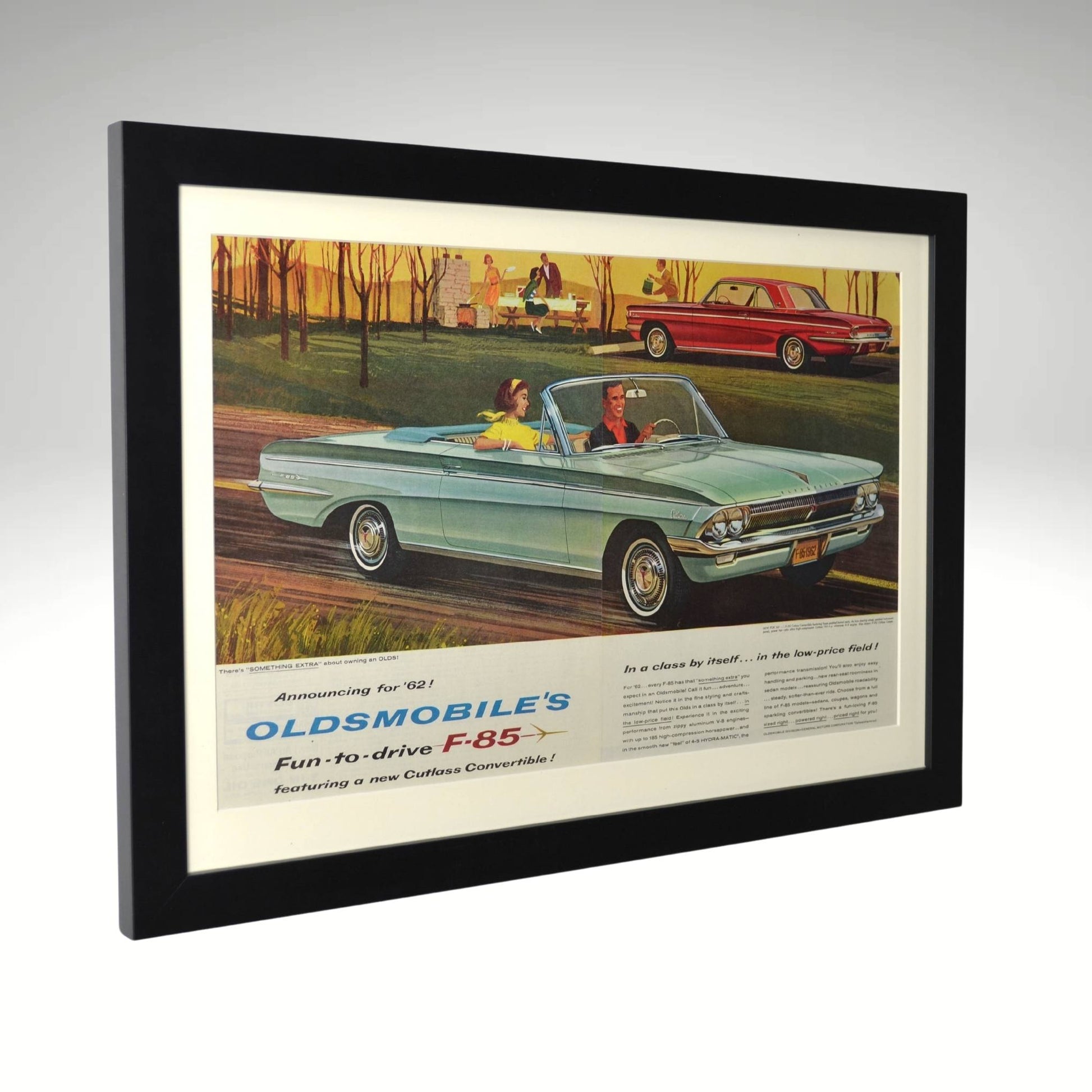 Side view of blue Oldsmobile F-85 Cutlass convertible framed print