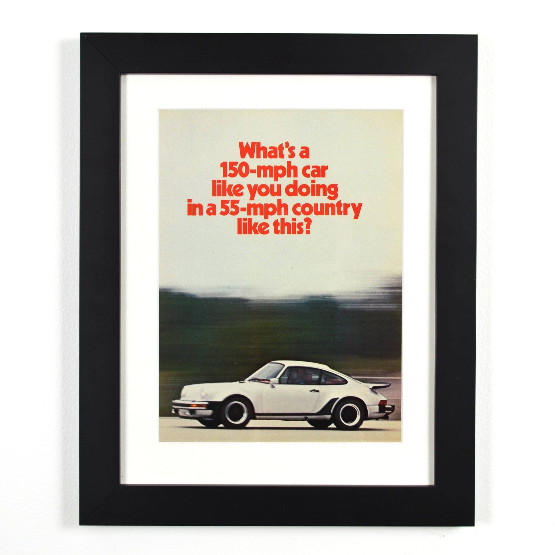 Framed Vintage Porsche 911 Turbo Print – Classic ‘150-MPH Car’ Advertisement – Collector’s Wall Art

