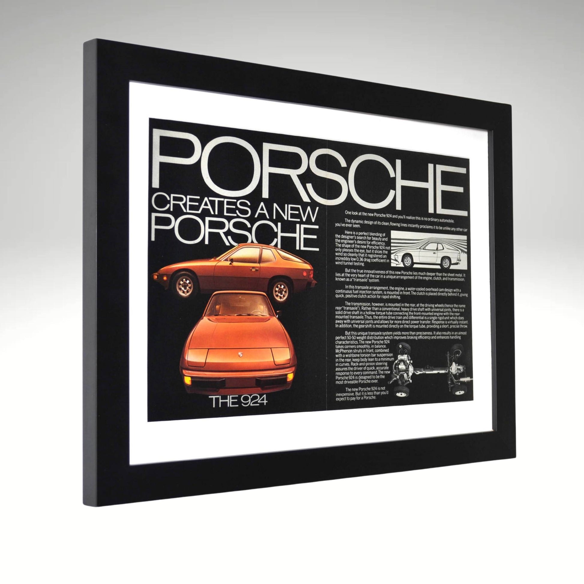 Framed Porsche 924 vintage ad with bold “Creates a New Porsche” headline side view

