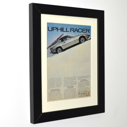 Framed Vintage Porsche 924 Print – Classic ‘Uphill Racer’ Skiing Advertisement – Collector’s Wall Art side view