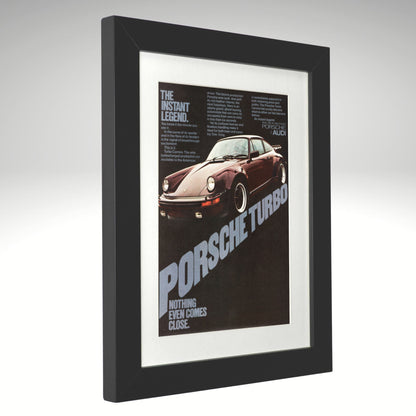 Framed poster of a Porsche Turbo with text on a gray background