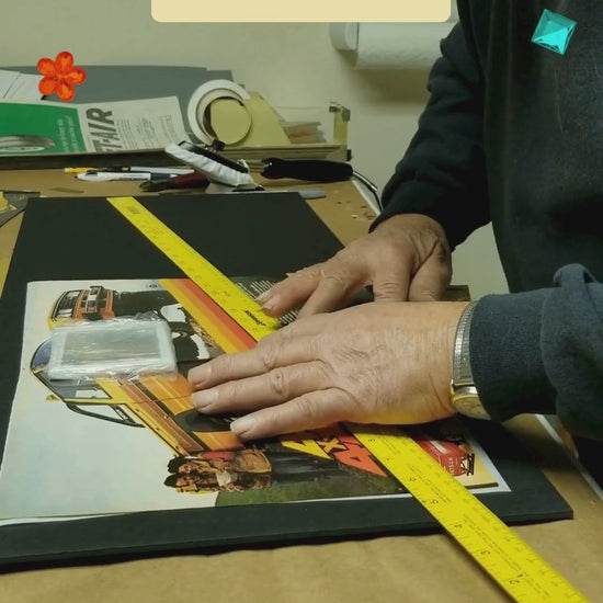 art being measured on foam board