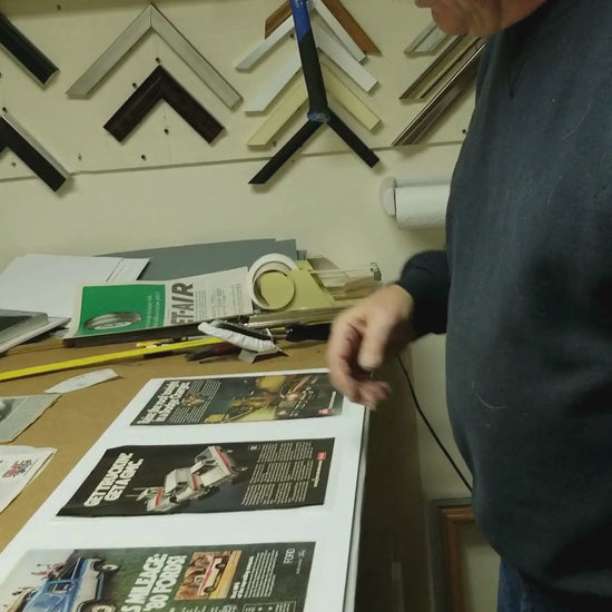video of vintage automotive prints and the dry mounting process by vintage art garage