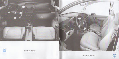Two views of a car interior with Volkswagen logo, labeled 'The New Beetle'.